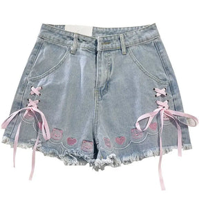 Short jeans bordado com laço